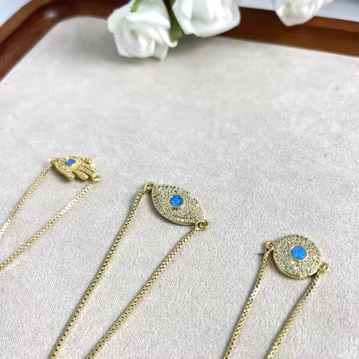Hamsa, Evil Eye, and Circular Opal Charm Bracelets