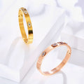 18K gold plated Evil Eye bangle bracelet with cubic zirconia by Koch La Ni
