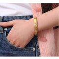 18K gold plated Evil Eye bangle bracelet with cubic zirconia by Koch La Ni