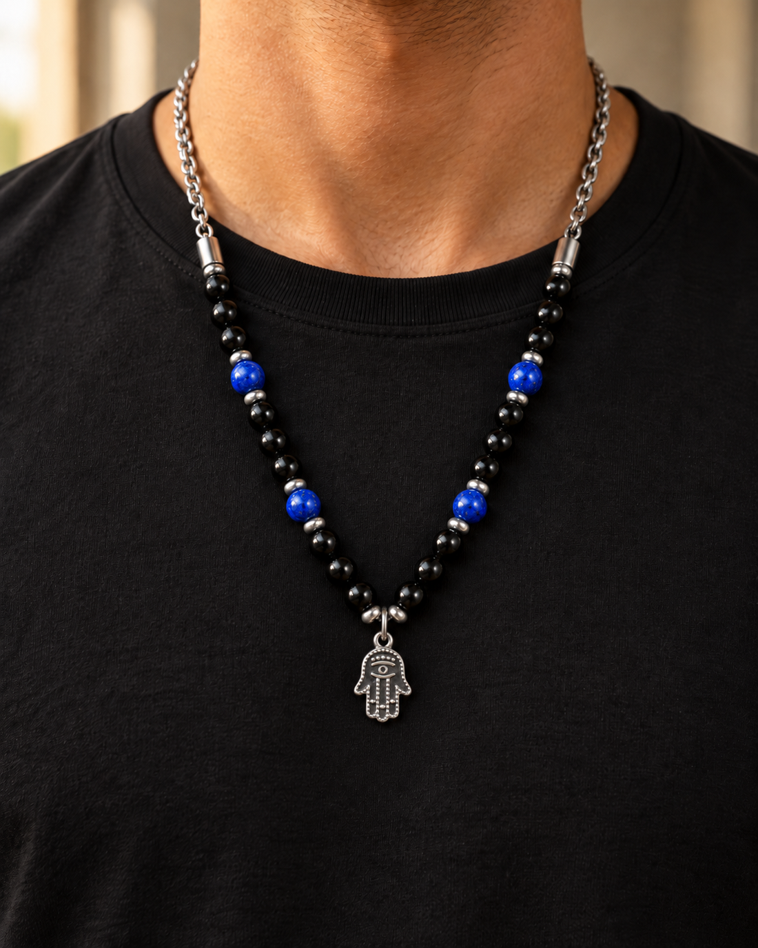 Koch La Ni stainless steel hamsa necklace with evil eye on black and blue beads