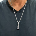 Man wearing the Classic all-silver mezuzah pendant on a 24 inch rope chain