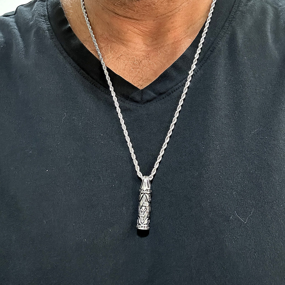 Man wearing the Classic all-silver mezuzah pendant on a 24 inch rope chain