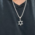 Blackened Star of David necklace worn mid-chest on a 24 inch 4mm rope chain