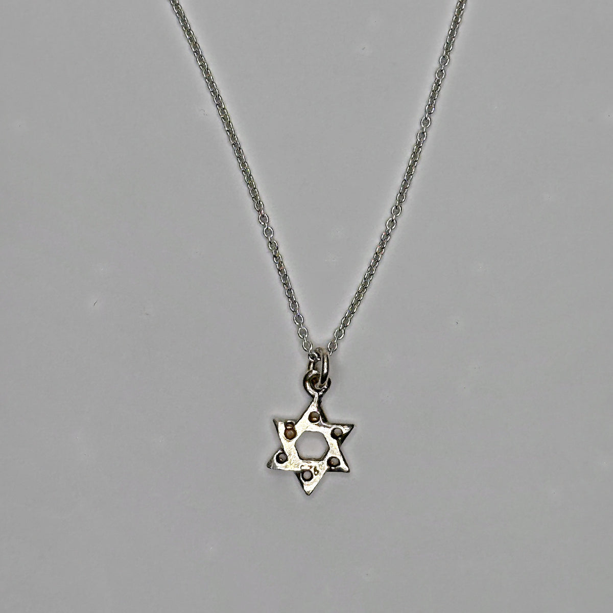 Sterling silver Star of David necklace with open center by Koch La Ni