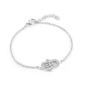Dainty Hamsa hand bracelet in stainless steel set with white cubic zirconia on an adjustable cable chain