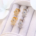 Hamsa stud earrings with evil eye crystal, part of The Rainbow Set by Koch La Ni